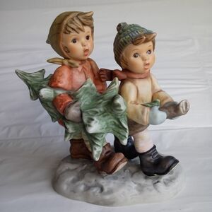 Charming Holiday Children Figurine with Tree